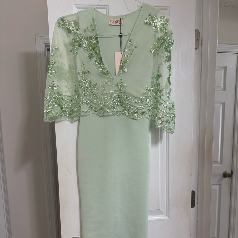 SEQUINS CAPE OVERLAY DRESS BY CLUB L LONDON.